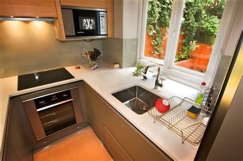 It would save a lot more space for your small house. Small Kitchen Design by LWK Kitchens London - Modern ...