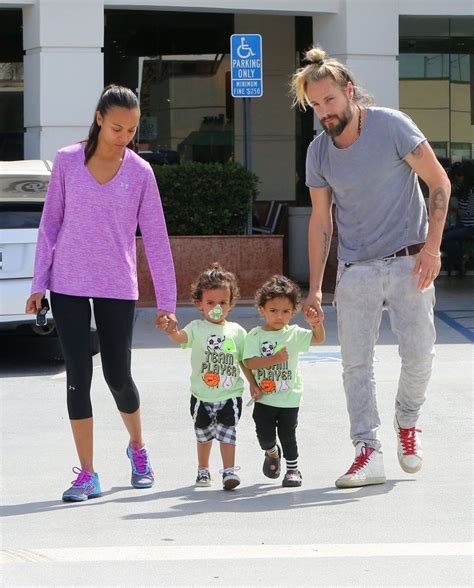zoe saldana heads out in los angeles with her husband marco perego and their twins cy and bowie