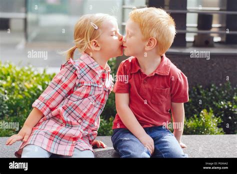 Cute Little Boy Girl Kissing Stock Photos And Cute Little Boy Girl