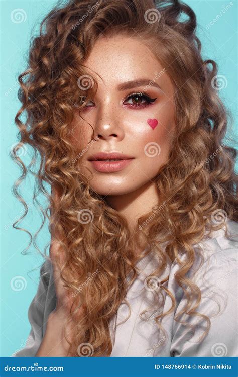 Pretty Girl With Curls Hairstyle Classic Makeup Freckles Nude Lips