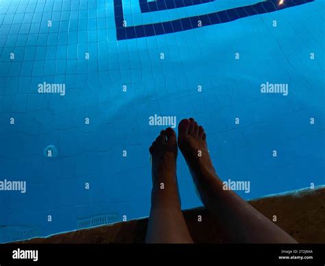 Male Feet Underwater In Swimming Pool Stock Photo Alamy