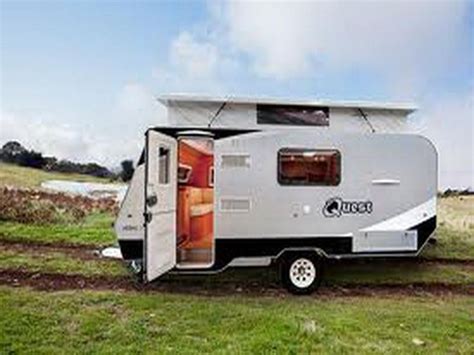 The entire rear end of the trailer is an enclosed bunkhouse, which has ample room for kids to play as well as sleep in. small travel trailer for family. I can see me and the ...
