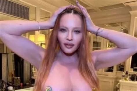 Madonna Fans Gobsmacked As She Strips Topless With Only Emojis