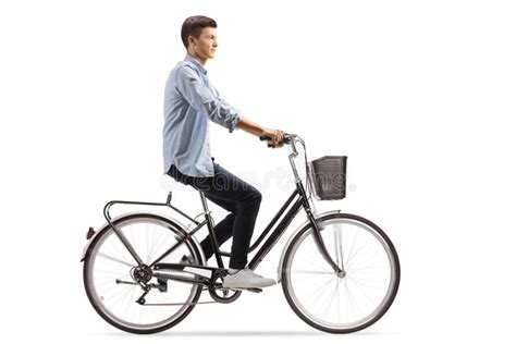 Profile Shot Of A Casual Guy Riding A Bicycle Stock Image Image Of
