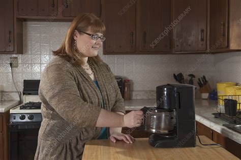 Visually Impaired Woman In The Kitchen Stock Image F