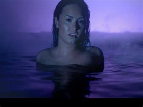 Demi Lovato Shows Sensual Side In Neon Lights Video