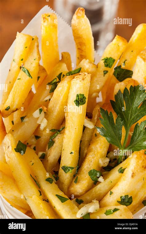 Garlic And Parsley French Fries With Ketchup Stock Photo Alamy