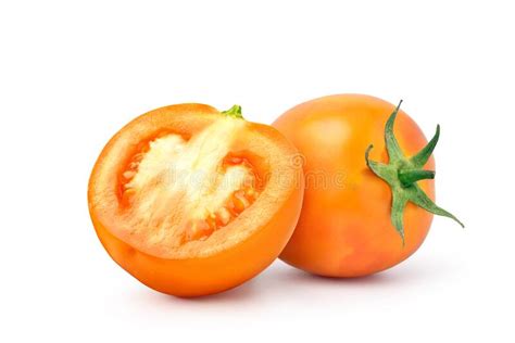 Tomates Naranjas Cortados Por La Mitad Imagen De Archivo Imagen De
