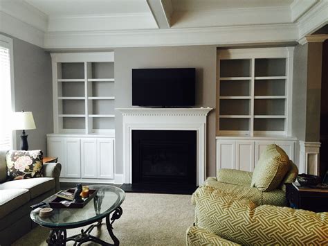 Built Ins With Mantel And Coffered Ceiling By Woodmaster Woodworks