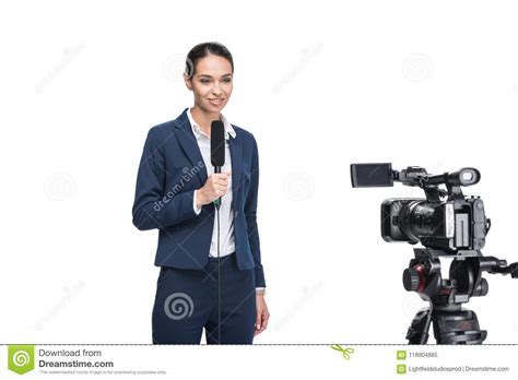 Beautiful Smiling Female Journalist With Microphone Looking At Camera