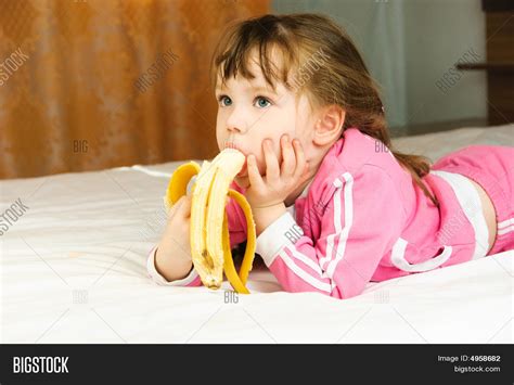 Little Girl Eating Image And Photo Free Trial Bigstock