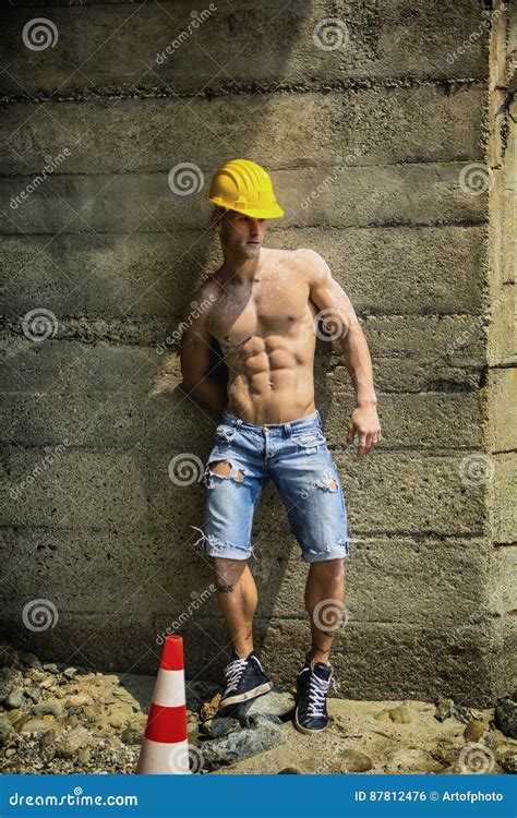 Muscular Construction Worker Shirtless In Building Site Stock