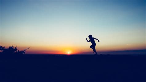 Silhouette Of Person Running On Hill During Sunset Hd Wallpaper