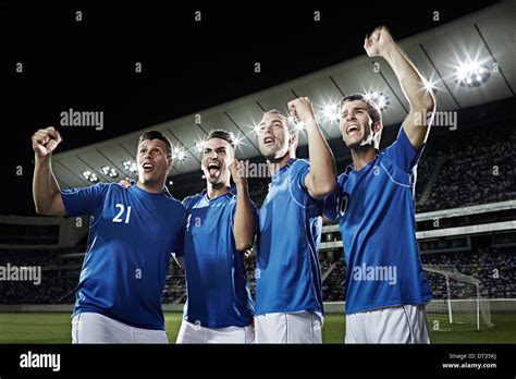 Soccer Team Cheering On Field Stock Photo Alamy
