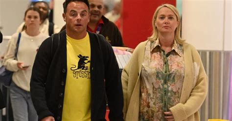 ant mcpartlin and wife anne marie corbett hold hands as they land in uk after romantic dubai