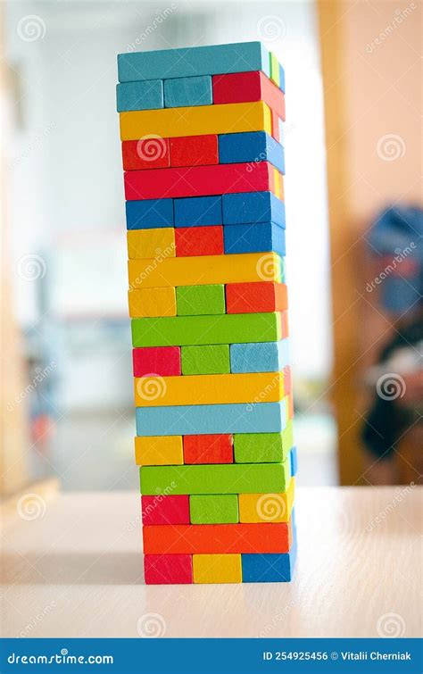 Tower Built Of Colorful Plastic Building Blocks Royalty Free Stock