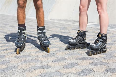 Premium Photo Fit Couple Rollerblading Together On The Promenade