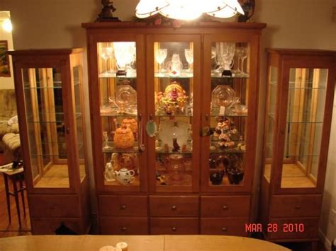 These curio cabinets with lights are made of real wood and feature a traditional motif. Handmade Maple Curio Cabinets by Codner's Custom Creations ...
