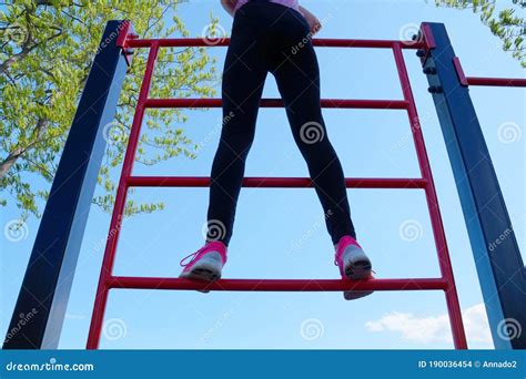 Girl Stands On A Sports Ladder Bottom View Stock Photo Image Of Ladder Exercise