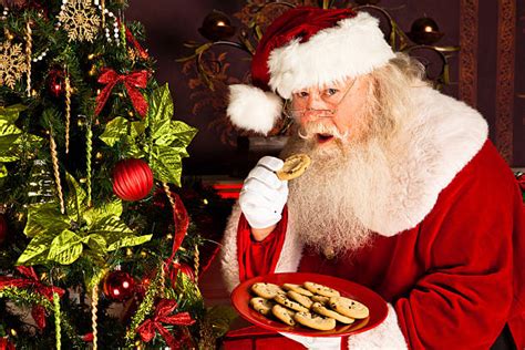 Cookie Eating Santa Claus Holiday Stock Photos Pictures And Royalty Free