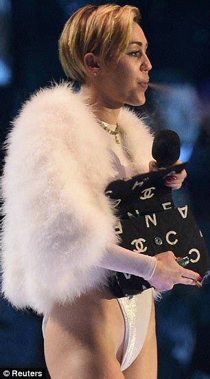 Miley Cyrus Explains Why She Lit Up On Stage At EMAs Daily Mail Online