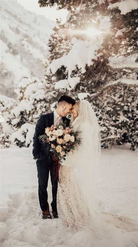 Dreamy Winter Wedding Photos With Snow Background Winter Wedding