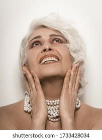 Nude Senior Woman Toothy Smilies Touching Stock Photo