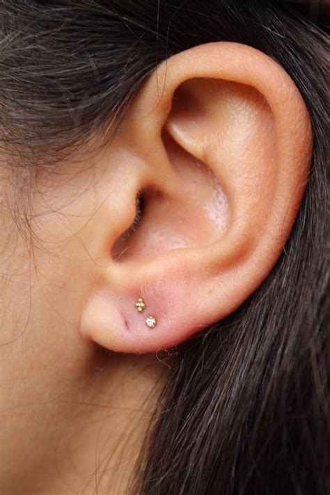 29 Insanely Cool Ear Piercings To Try This Summer Triple Lobe Piercing