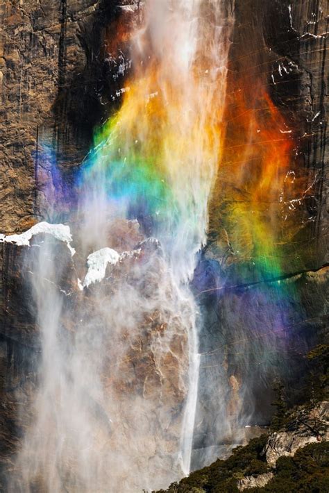 A Stunning Rainbow In The Mist Of The Yosemite River Waterfall