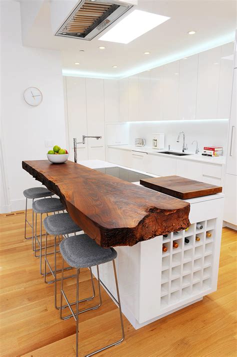 The kitchen island is made of oak with a thin, black stone countertop. Kitchen Design Idea - 5 Unconventional Materials You Can ...