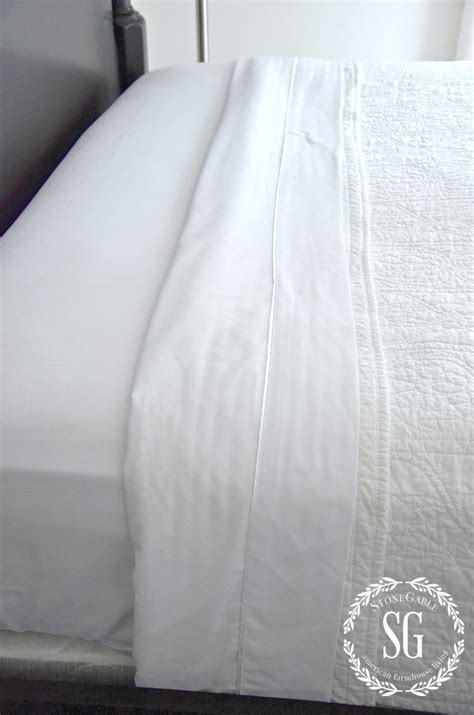 layering bedding   designer tips  tricks