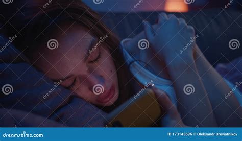 Close Up Of Young Depressed Girl Crying While Reading Old Messages On Her Smartphone Sad Woman