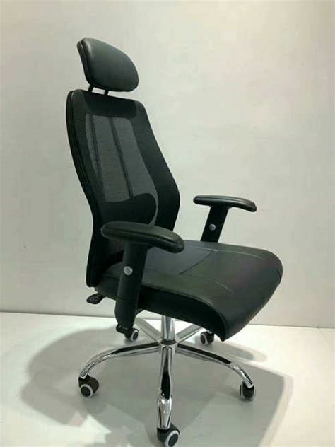 A work chair should be an investment. High-quality black high back mesh fabric office chair work ...