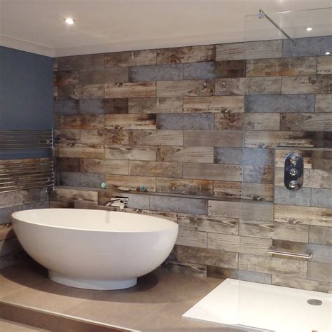 Rachel Created A Rustic Cabin Bathroom With Reclaimed Wood Tiles