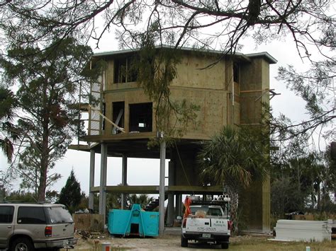 This Elevated Home Built On Concrete Pilings Was Engineered To