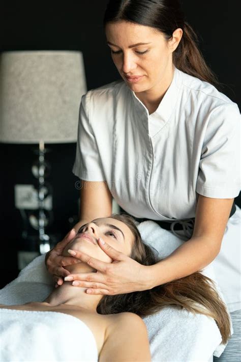 Young Beautiful Woman Having Massage In Spa Salon Stock Image Image