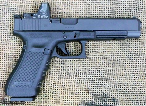 Glock Model 35 Gen 4 Pistol 40 Sandw Cal With Trijicon Rmr Sight