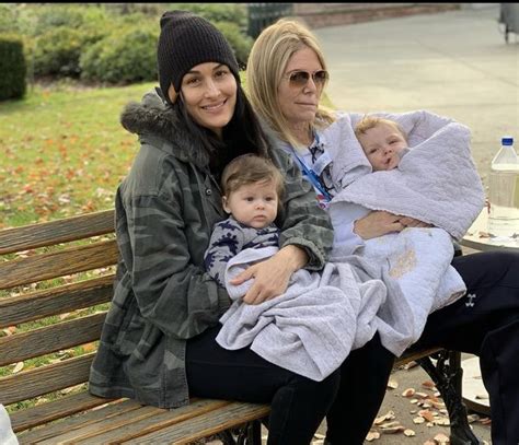 Nicole Holding Her Son Matteo While Kathy Hold Her Grandson Buddy
