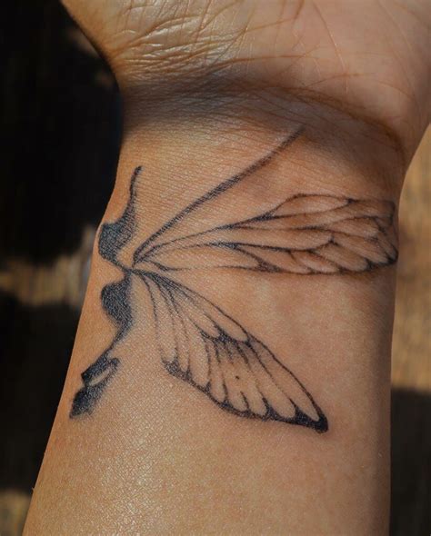 11 Wrist Angel Wings Tattoo Ideas That Will Blow Your Mind