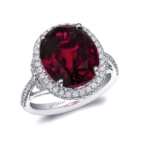 Https://tommynaija.com/wedding/garnet With Diamond Centerpiece Wedding Ring
