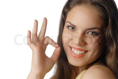 Beautiful Smiling Model With Ok Gesture Stock Photo