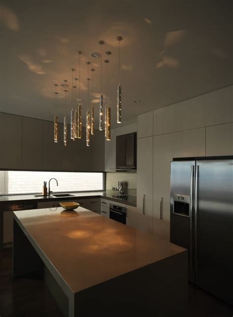 Kitchen is semi open to dr and entry way, where we have large nelson bubble fixtures currently, there are two, four light pendants hanging from our sloped ceiling. Track Lighting With Pendants - HomesFeed
