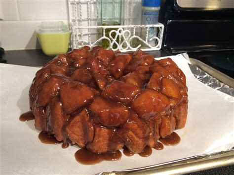 Monkey bread biscuitsfamily around the table. Erica's Monkey Bread: 2 (16 oz.) cans of biscuits, 1 stick of unsalted butter, 1 1/2 cups brown ...