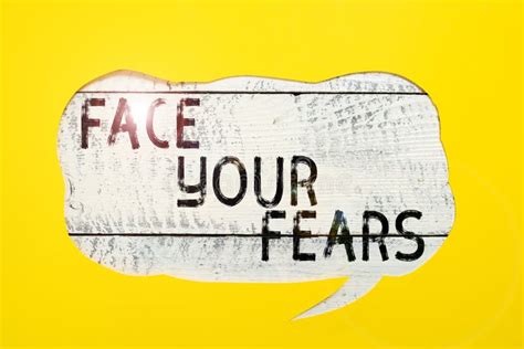 Sign Displaying Face Your Fears Word For Have The Courage To Overcome