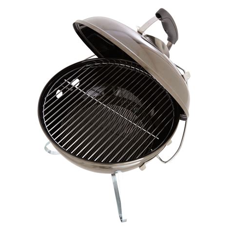 An Outdoor Bbq Grill Is Shown With The Lid Open And Its Handle Extended