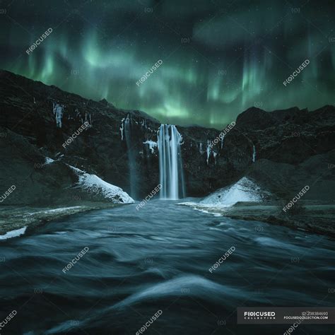 Aurora Borealis Over Beautiful Icelandic Waterfall — Vacation Outdoor