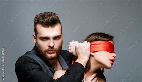 Macho Well Groomed Confident Hipster And Sexy Woman Tied Hands Red