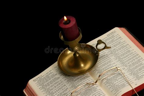 Lighted Candle On Open Bible Stock Photo Image Of Religious