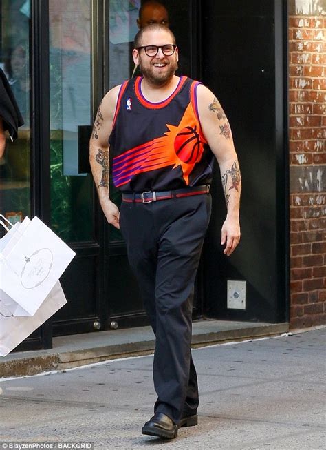 Jonah hill is a fully fledged style icon. Jonah Hill shows off his guns in Phoenix Suns jersey ...