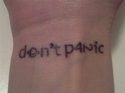 This is my tattoo from the hitchhiker's guide to the galaxy by douglas adams. Don't panic Hitchhiker's Guide to the Galaxy tattoo 42 | Galaxy tattoo, Nerdy tattoos, Tattoos